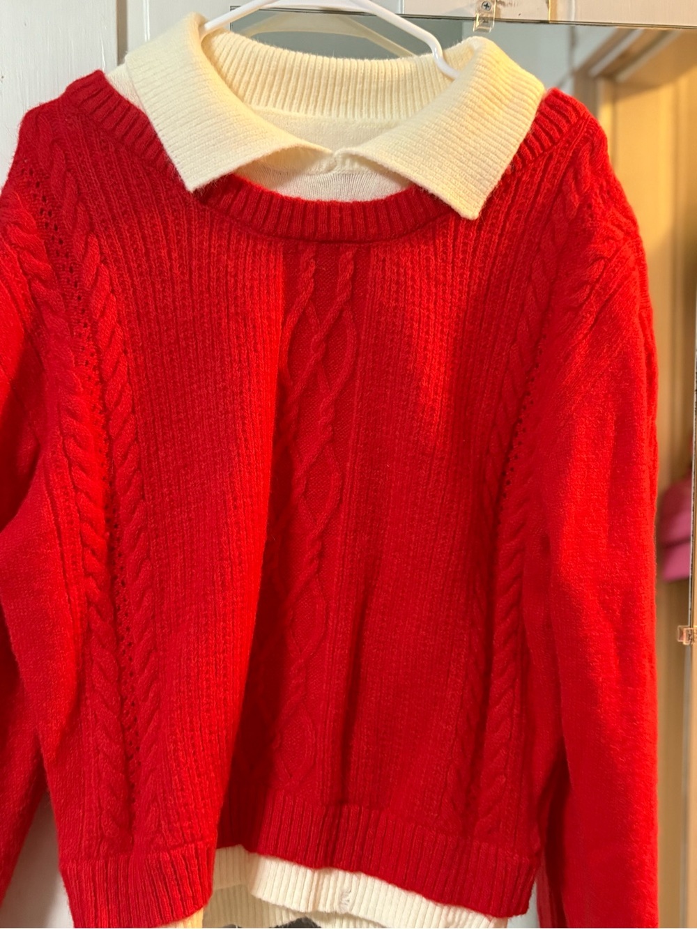 Cider Red Cable-Knit Sweater with Cream Collar.